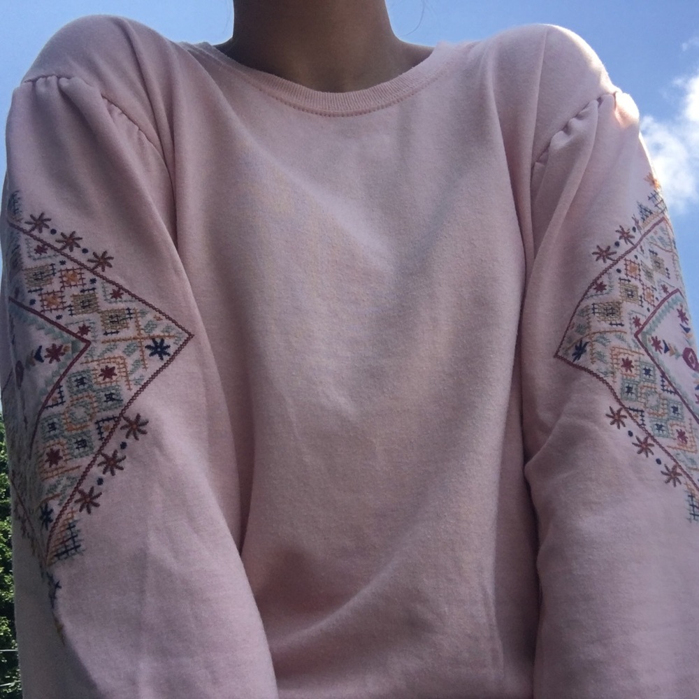 pink art class sweater